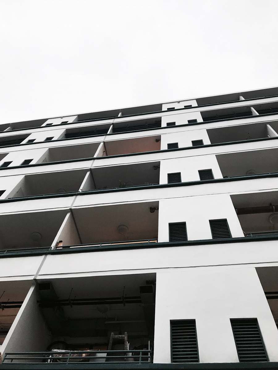 high rise low angle photo of concrete building town